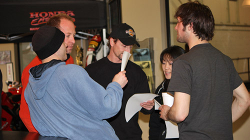 Darren, George, Danny, Sue and Jake Looking at Times